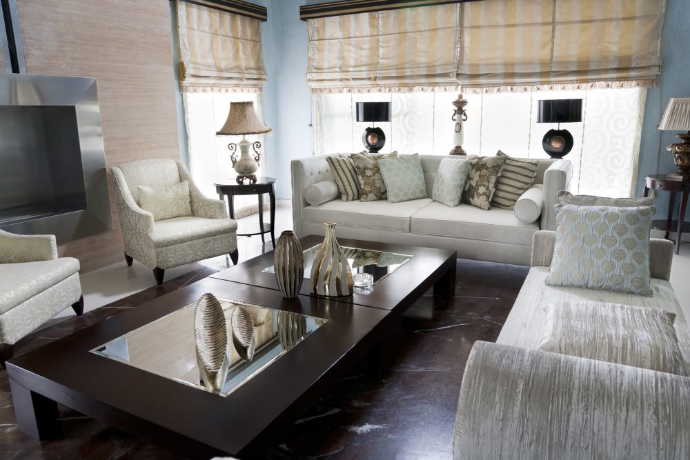 Living room with sofa, armchairs and coffee table.